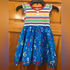 Pre owned Eleanor Rose ruffled sleeved dress with pockets. Size 6